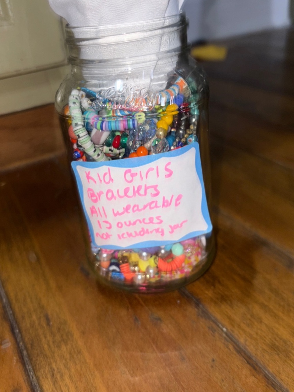 Jar of Colorful Kids Bead Bracelets